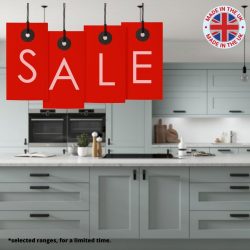 Graphic showing a grey kitchen with the words sale on red tags hanging above the kitchen